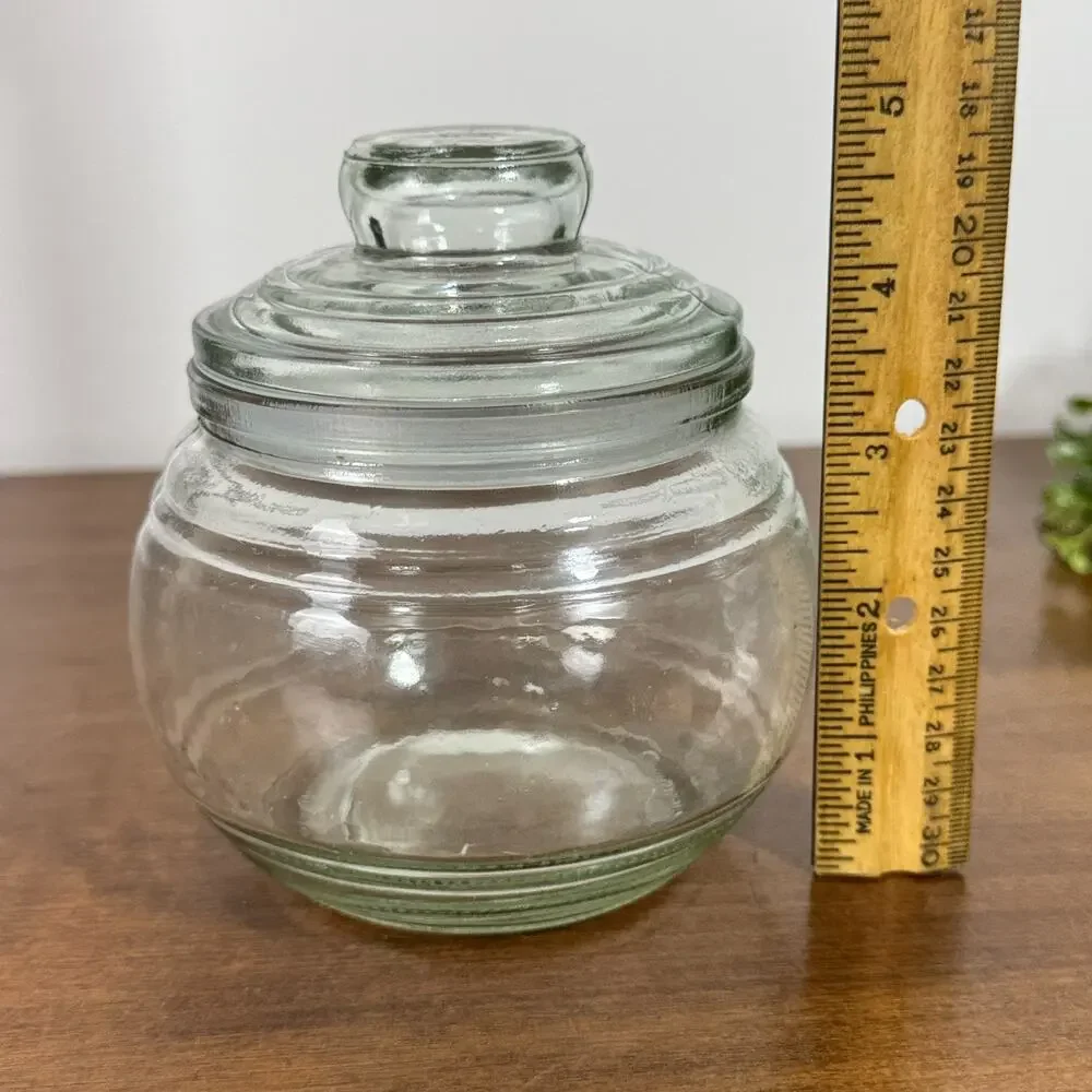 Clear Glass Apothecary Storage Jar with Lid Star Design on Lid 5